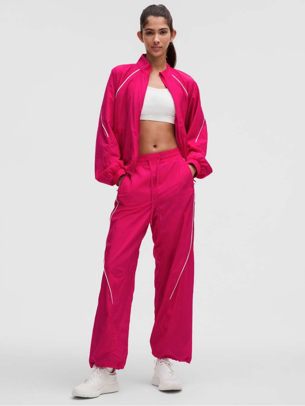 lululemon athletica license to train jacket and track pants in “passionate”